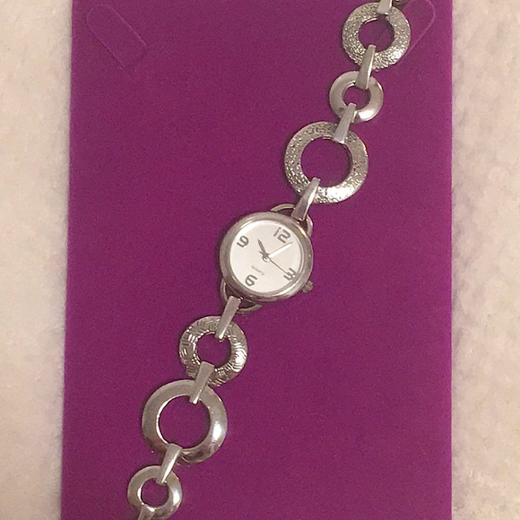 Silver toned watch. Walmart. 6 3/4 inches long. Used, like new. - Picture 1 of 5
